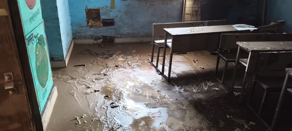 Havoc in 49 schools; notebooks and textbooks lie in the rubble.