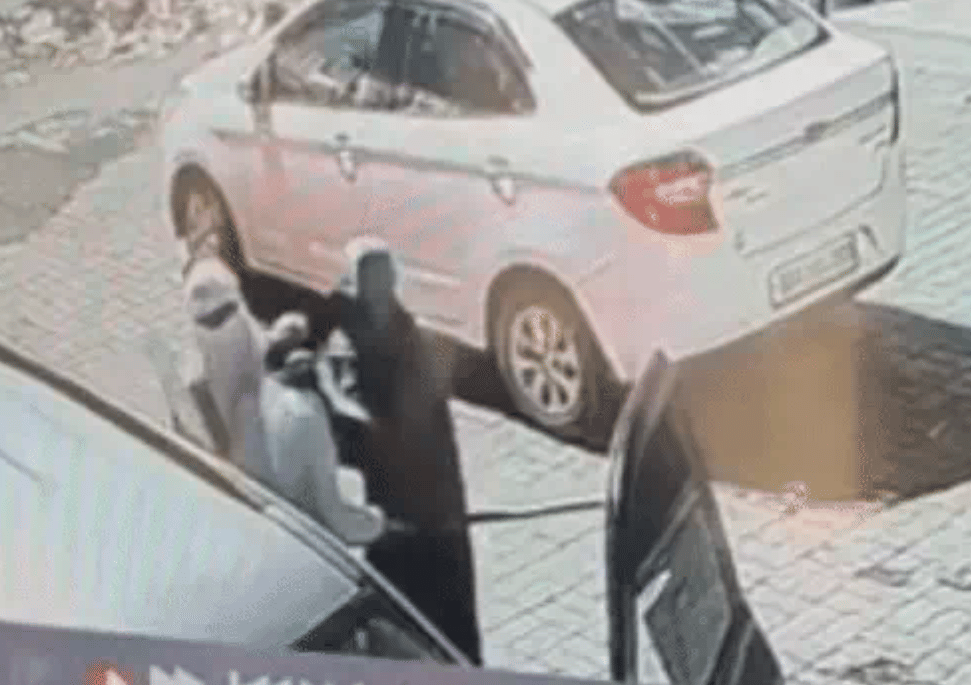 Watchman held hostage in vehicle; shop looted