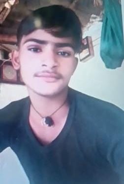 Youth's body found hanging from a tree; family suspects murder.