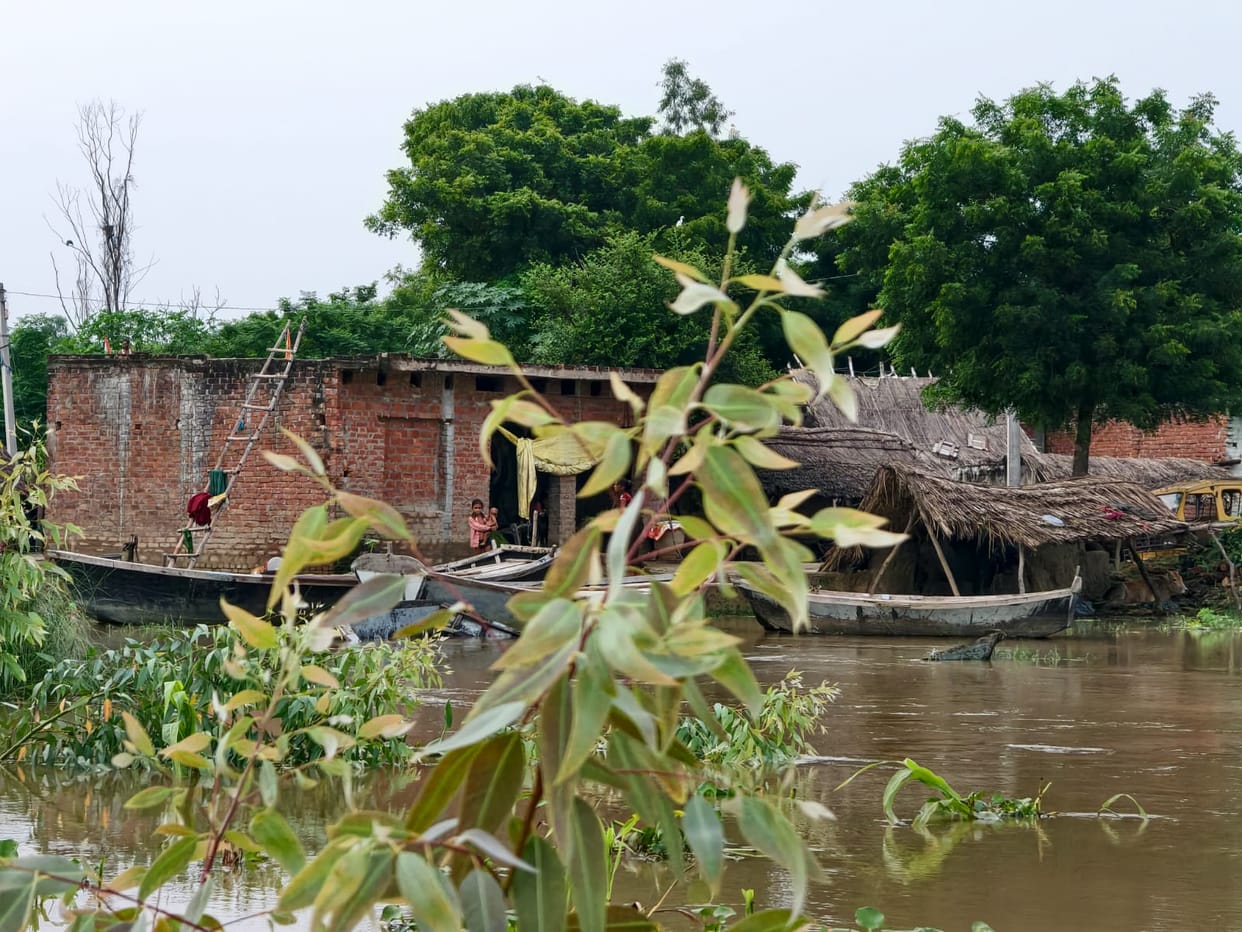 Water advanced towards the affected villages; crops began turning yellow due to waterlogging.