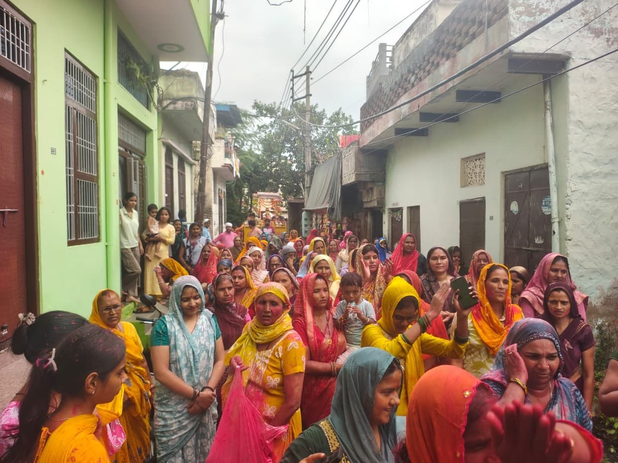 Chants of devotion echoed during the Laddu Gopal procession.