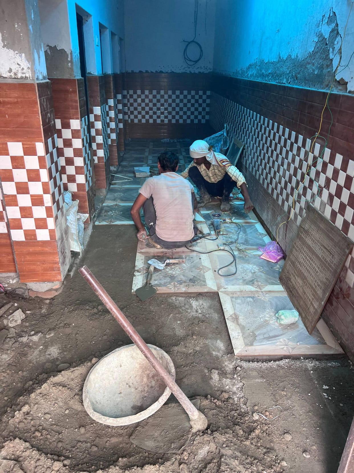 Renovation work begins on a dilapidated community toilet