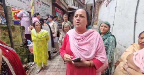 Women outraged over security arrangements and the gathering of drug addicts.