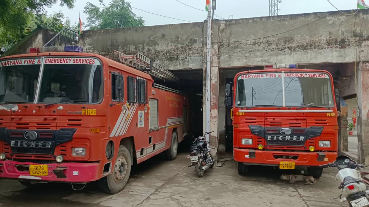 Staff working in the dilapidated fire station