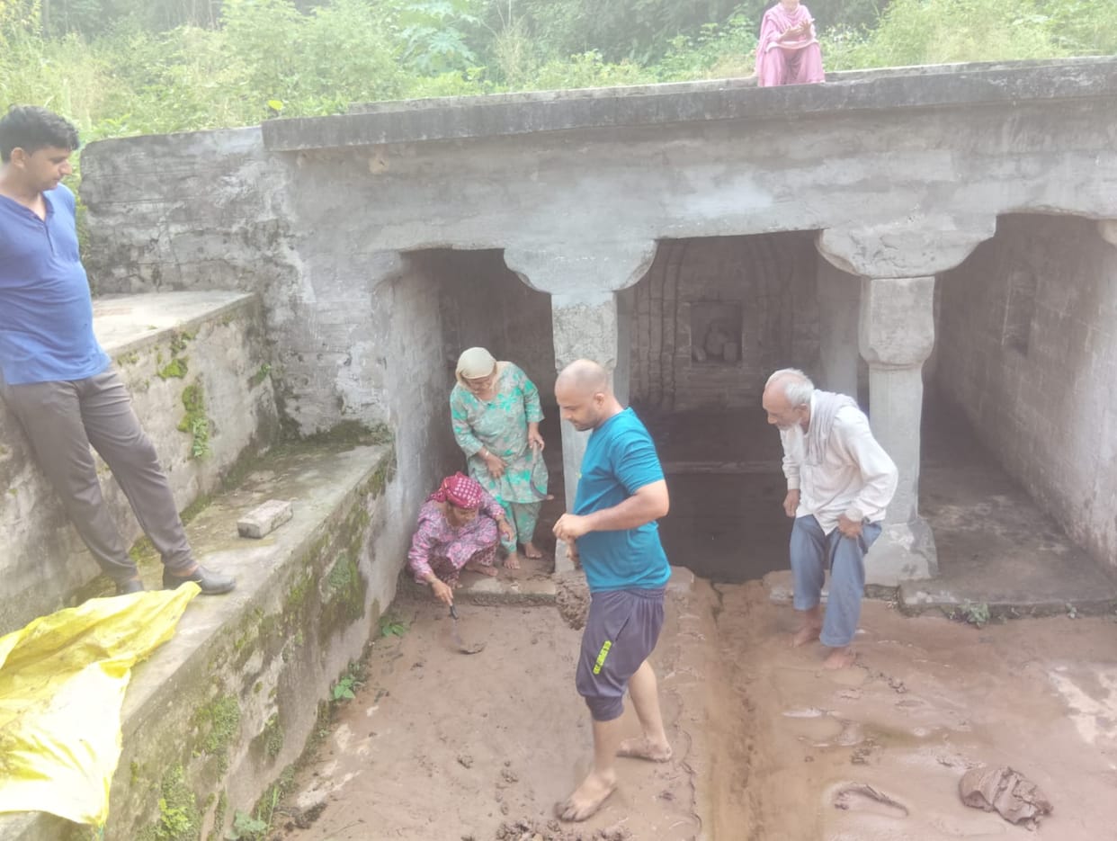 Risk of drinking water source contamination due to four-lane construction debris falling into a centuries-old stepwell.