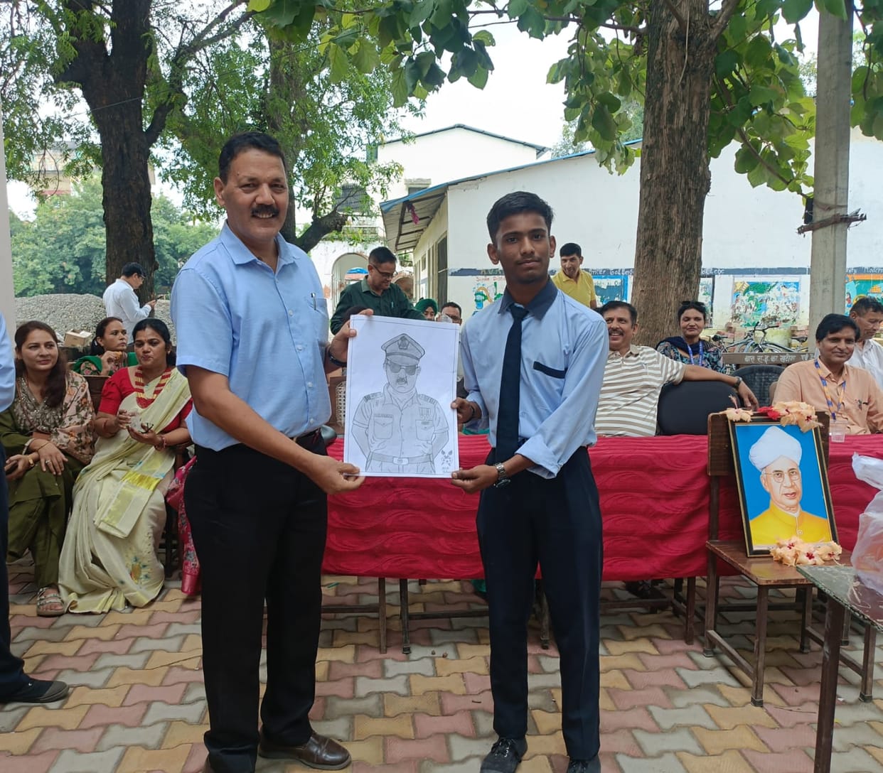 A student created a portrait of his teacher on Teachers' Day.