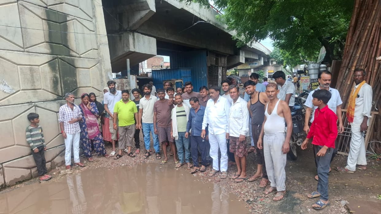 Overflowing pond turns lane into a problem in Pihura