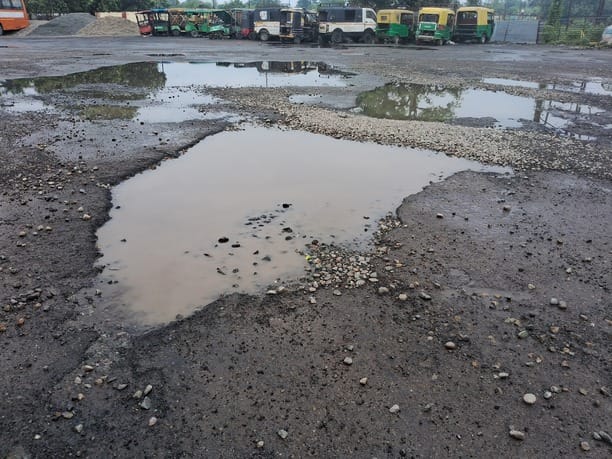 Road worth crores falls into disrepair after the first rain; questions raised about quality.
