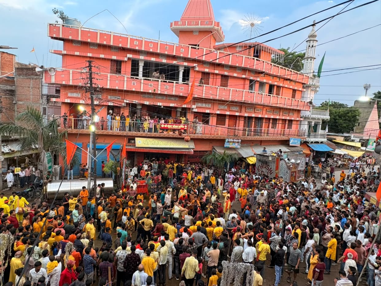 A massive surge of devotion at the Janmashtami Dola procession.