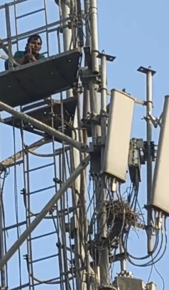 A young man climbed a tower after a dispute with his wife, but was persuaded to come down by the police.