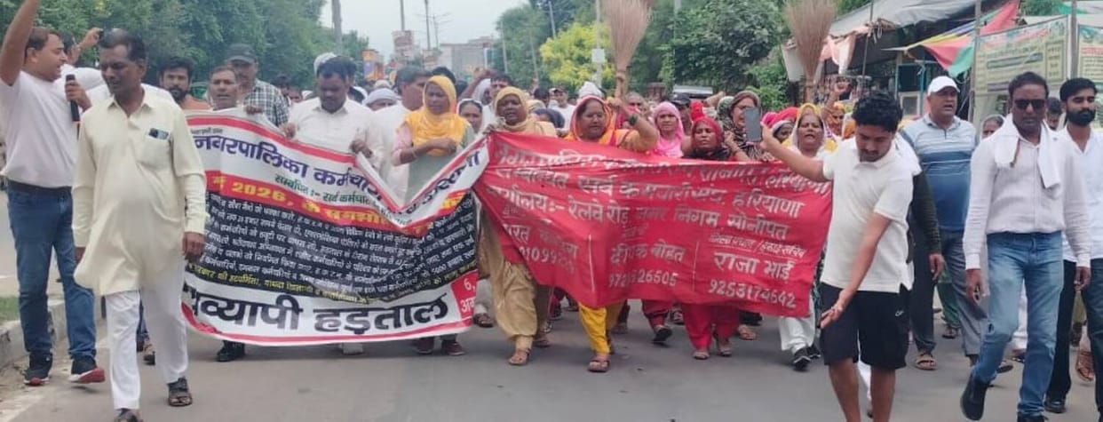 200 sanitation workers arrived at the Cooperative Minister's office carrying brooms.