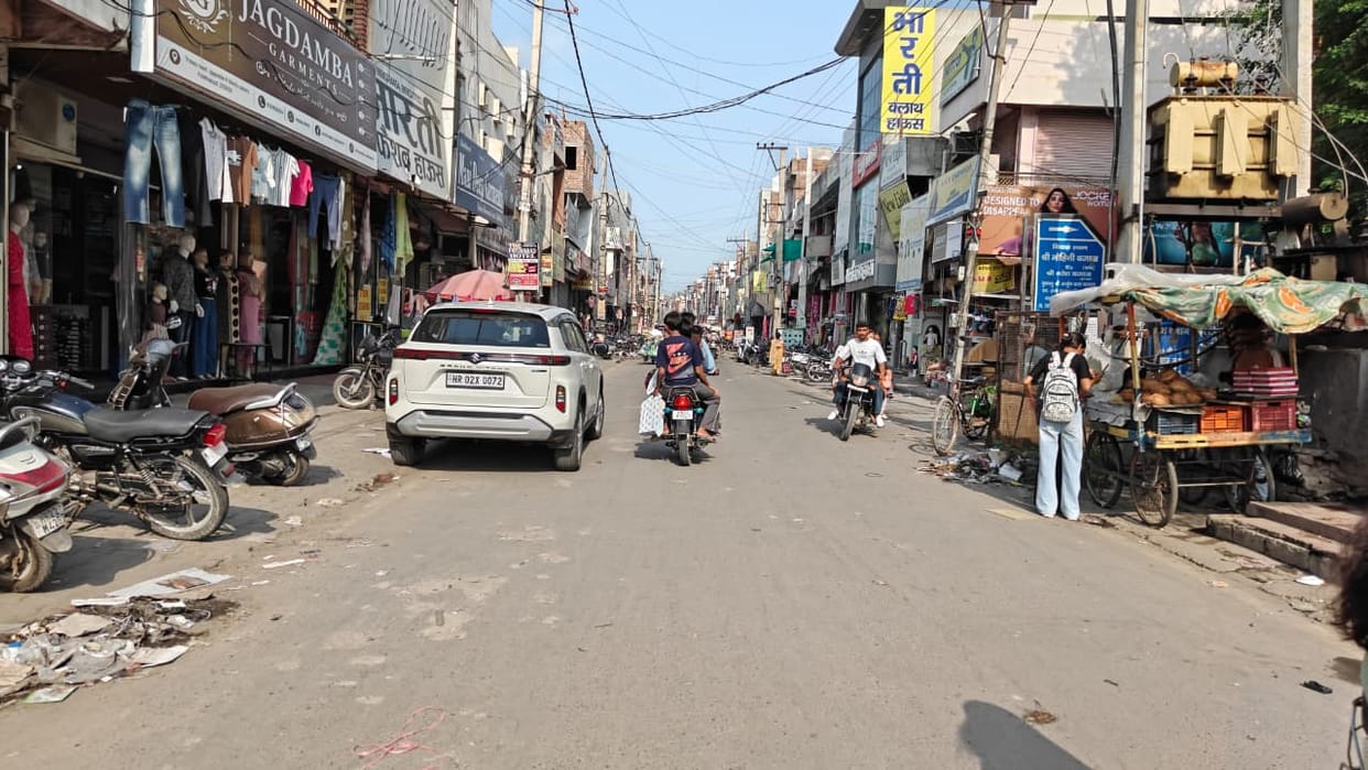 Work on laying pipes in the main market to streamline traffic arrangements has stalled