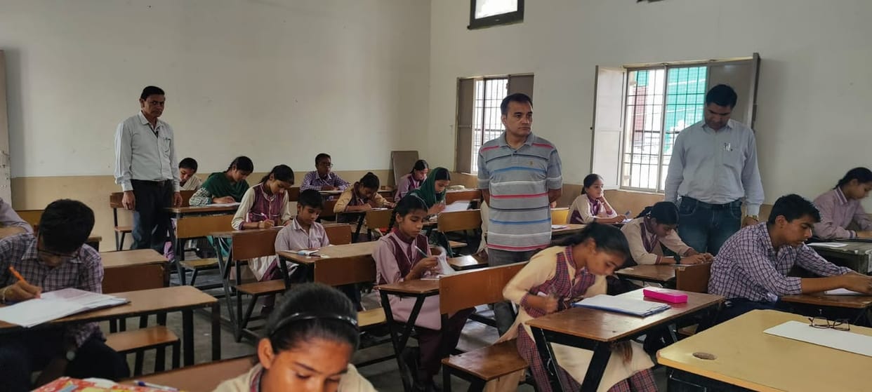 402 students took the Mathematics Olympiad exam.