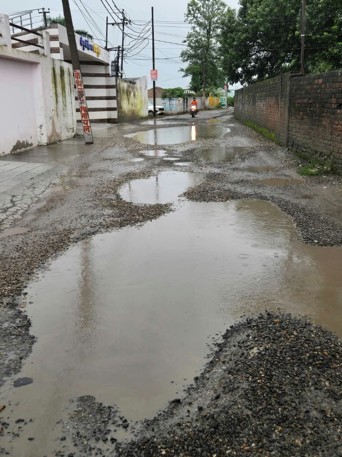 Road not built for nine years; Bigwara turns into a pond during the rains.