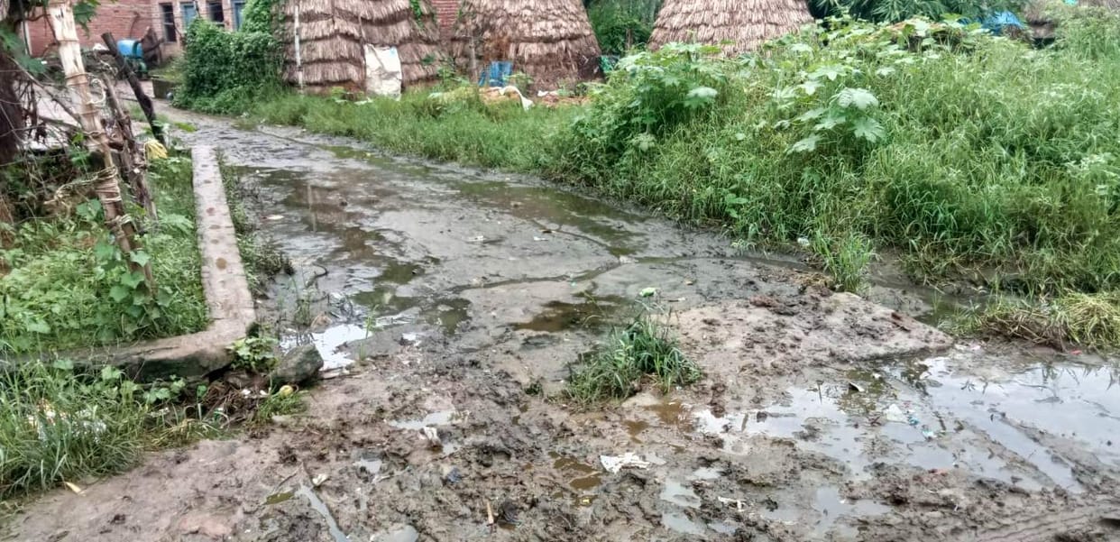 The road to Khiriya village has become a muddy mess due to the rain.
