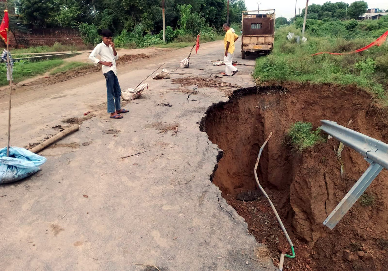 Road washed away by rain near Kunwarkheda on the Pinahat-Nandgava route.