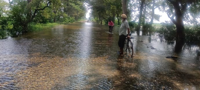 Commuters troubled by waterlogging at Bhimkund T-junction.