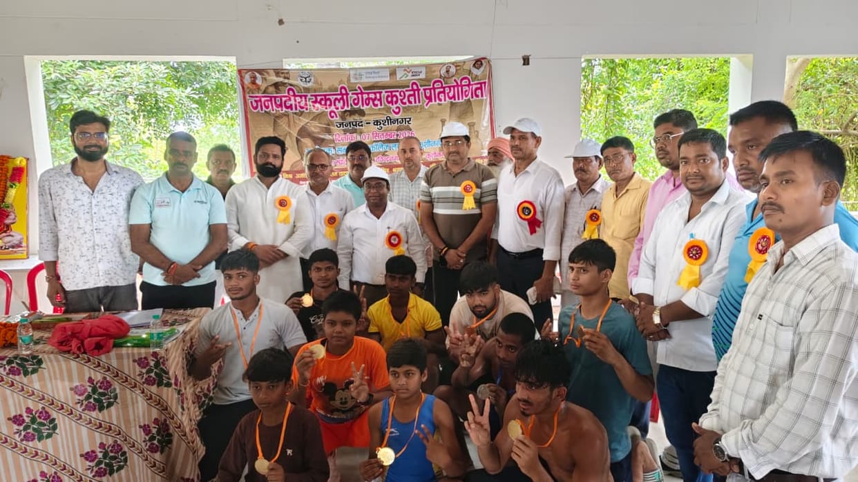 Players showed their strength in district level wrestling