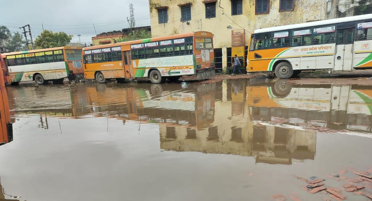 Rain exposes the city's dilapidated roads; mud becomes a nuisance as the water recedes.