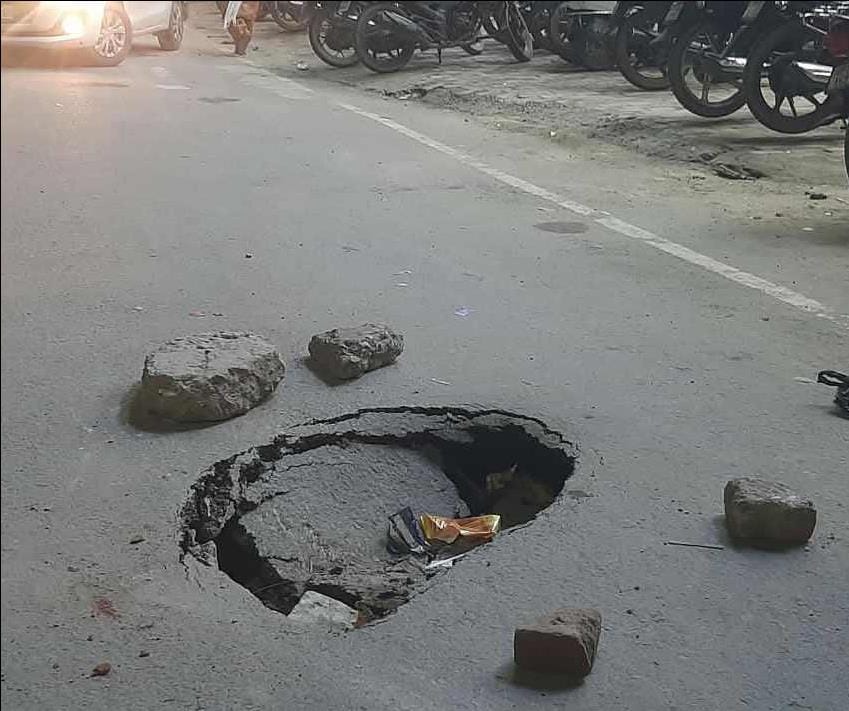 A deep pothole suddenly appeared at Agrasen Square.