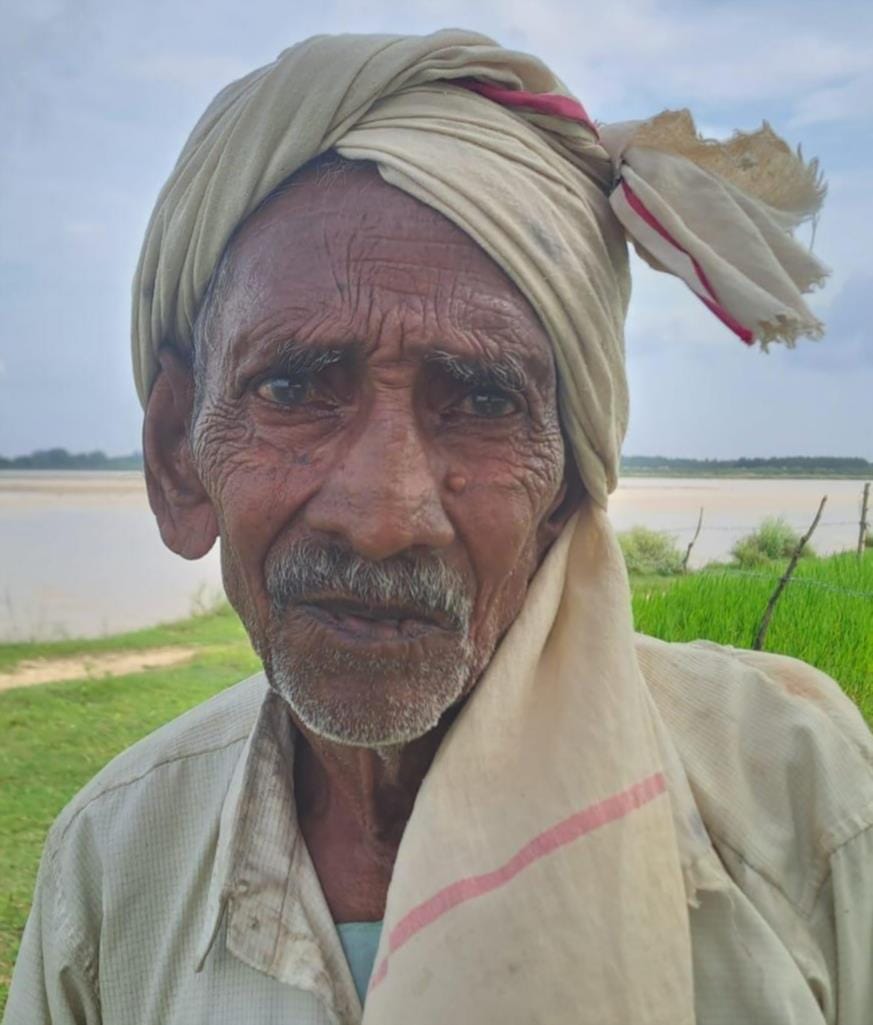 Crop-laden fields submerged by the Rapti River.