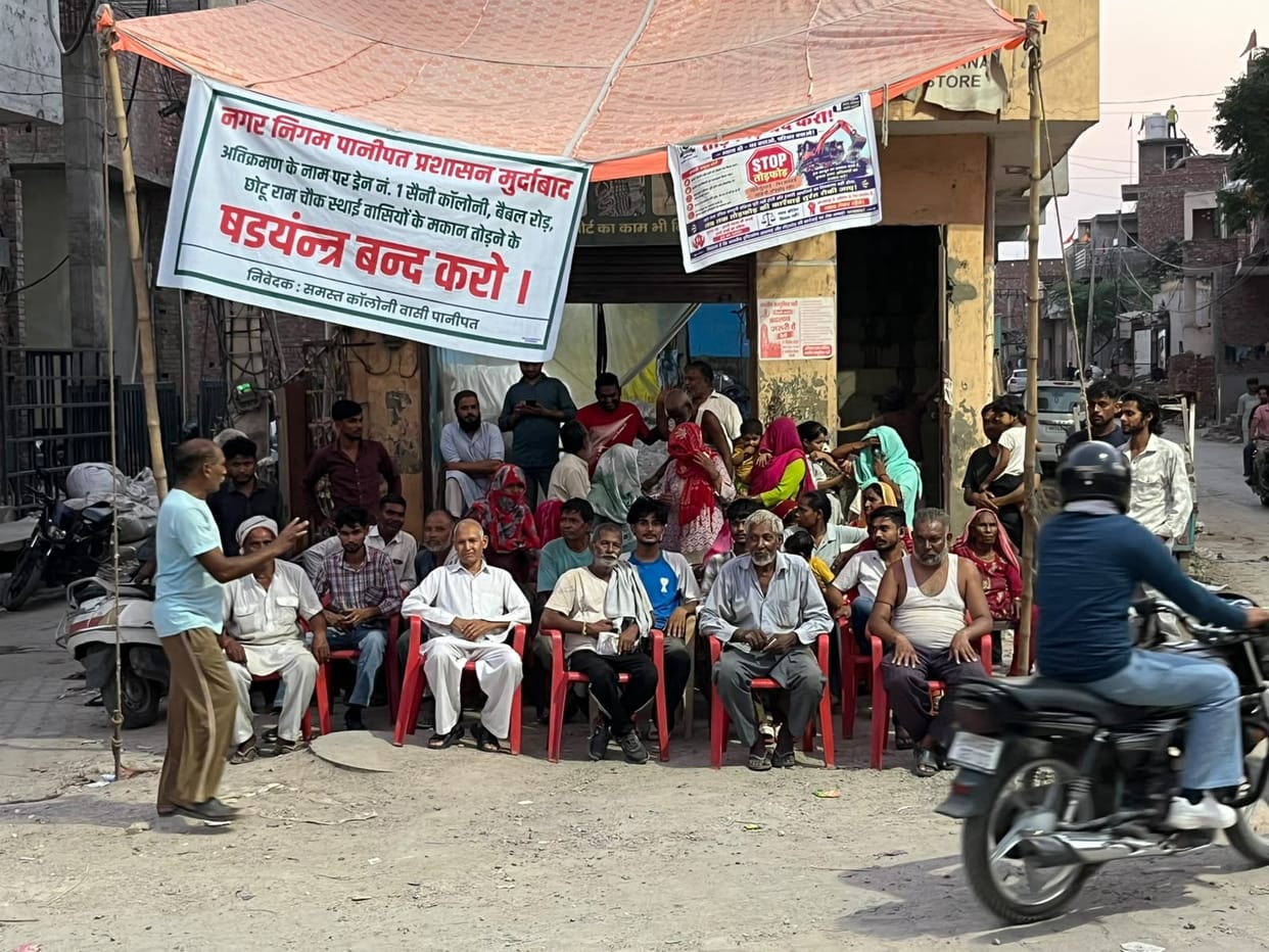 Indefinite sit-in protest at Chhotu Ram Chowk against the removal of encroachments.