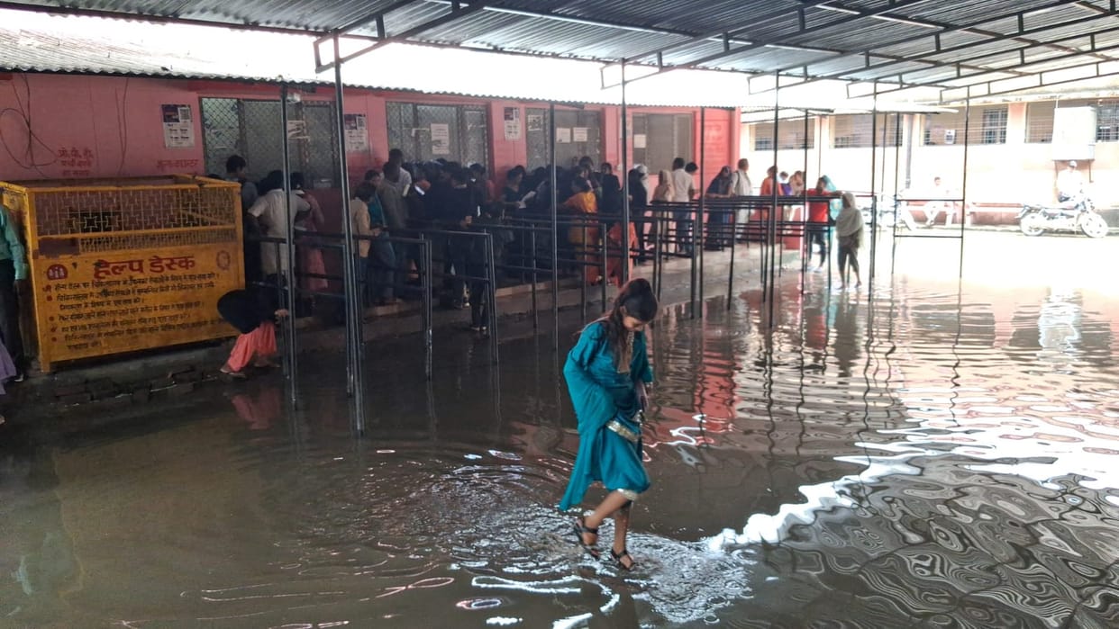 Standing in the mud to get the form, long queues for consultation