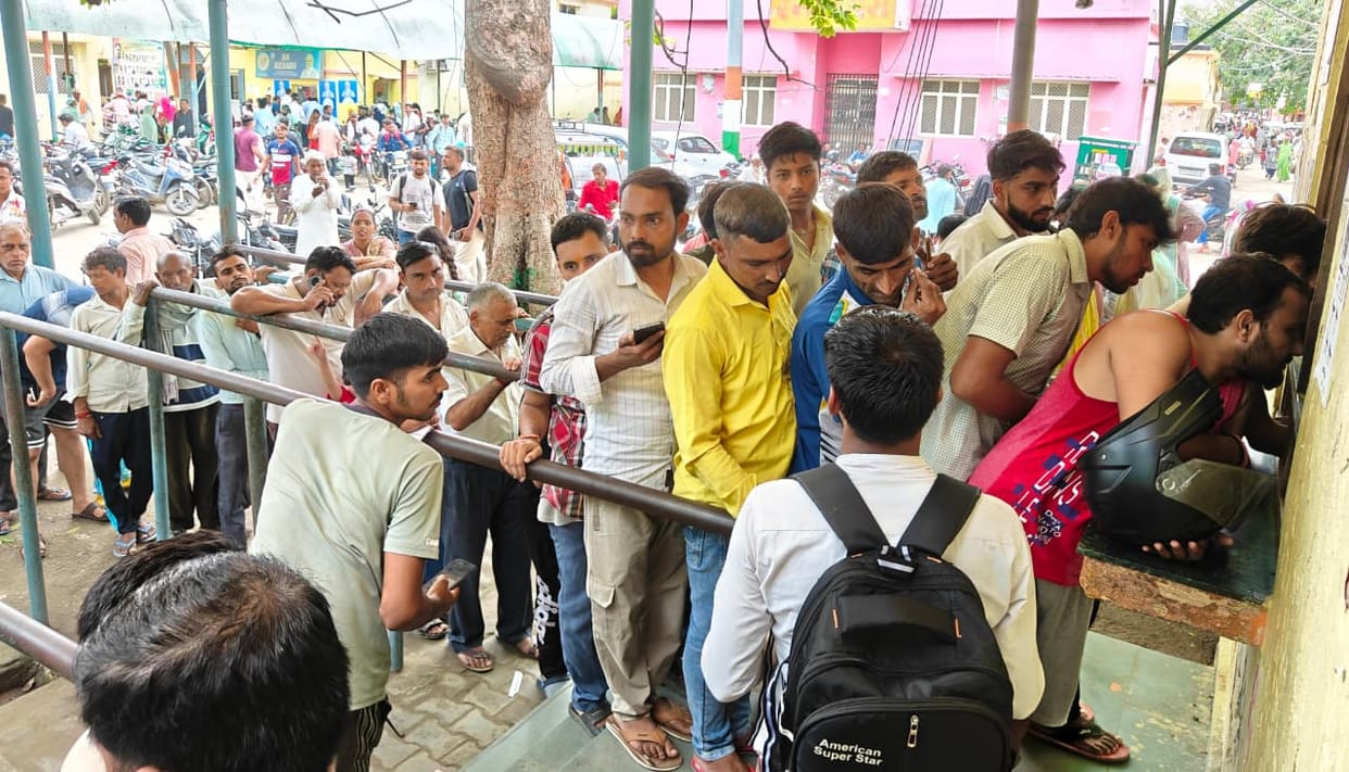 People are unconcerned about swine flu and are not wearing masks.