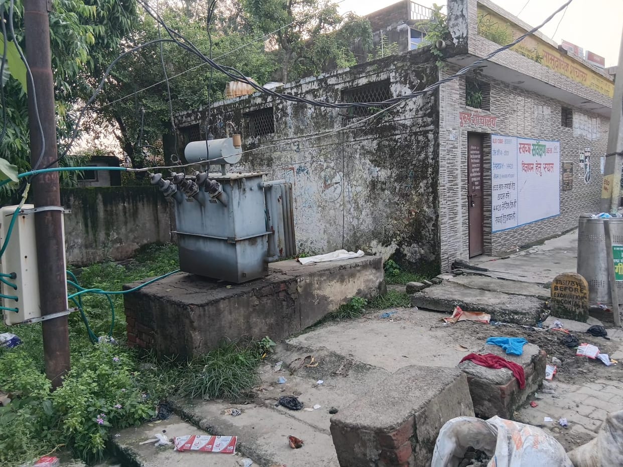 Transformers left without protective mesh; risk of electric shock during rain.