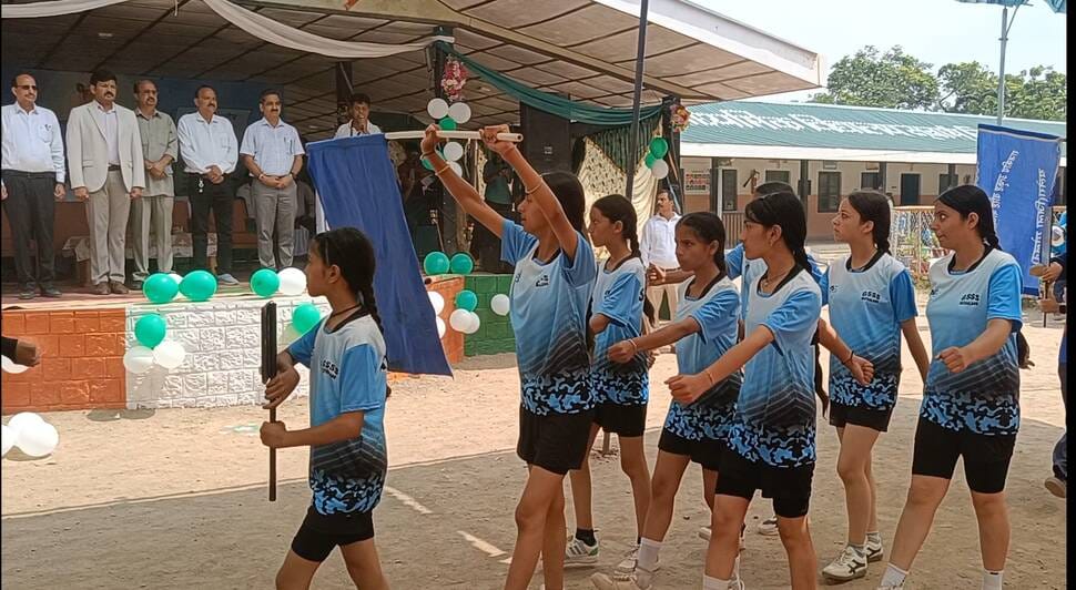 District-level sports competition for female students begins with a march-past.