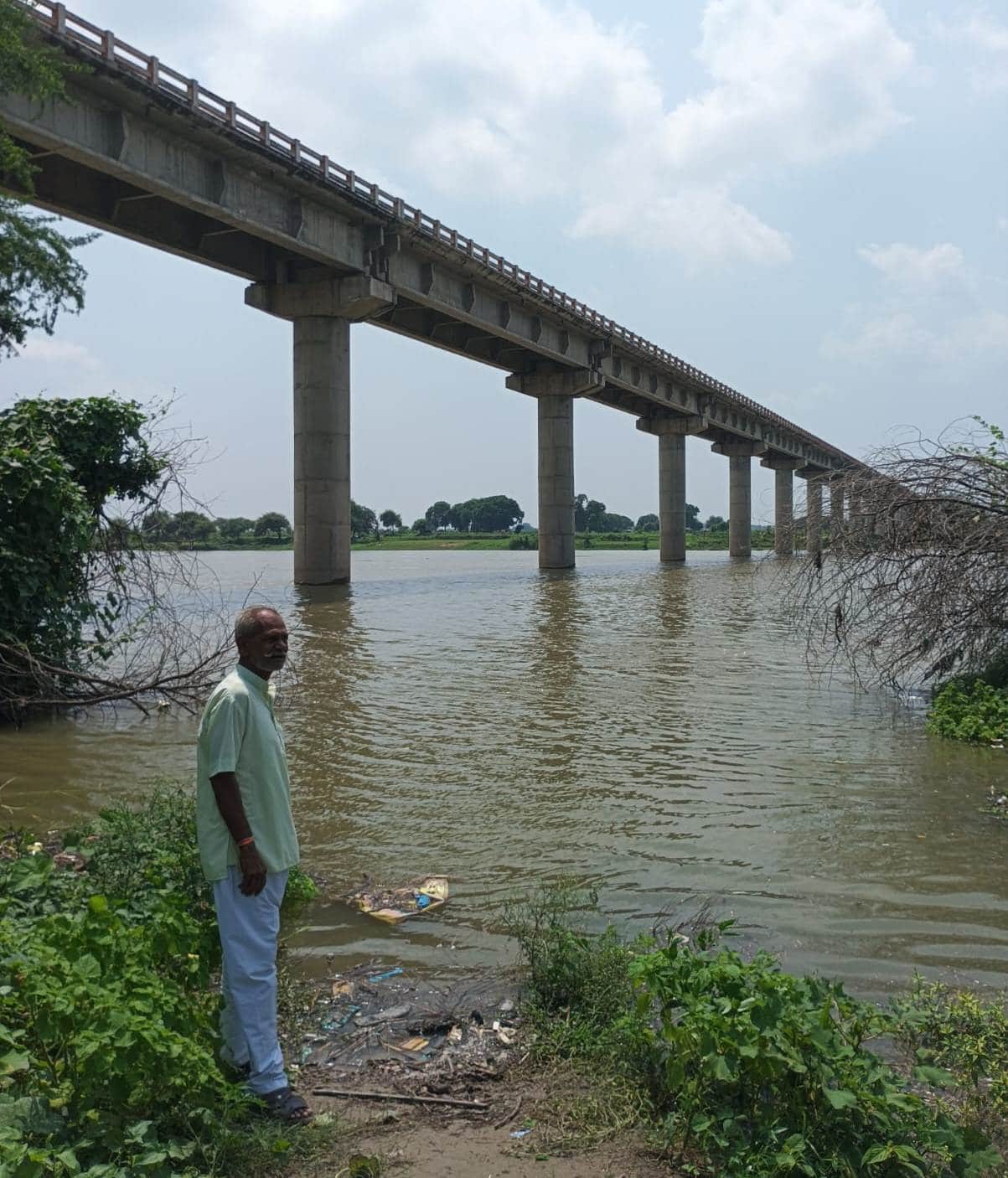 Yamuna floodwaters reach the threshold of Sikrodi village; the road to Badera village is submerged.