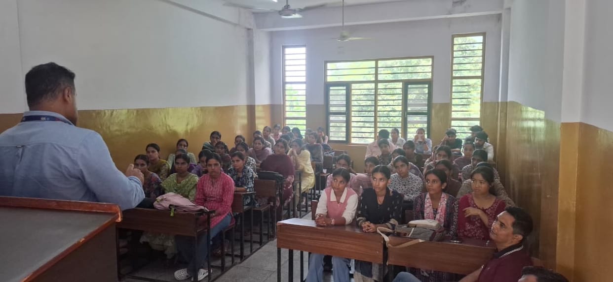 Students at Naina Devi College taught how to protect themselves from cyber fraud.