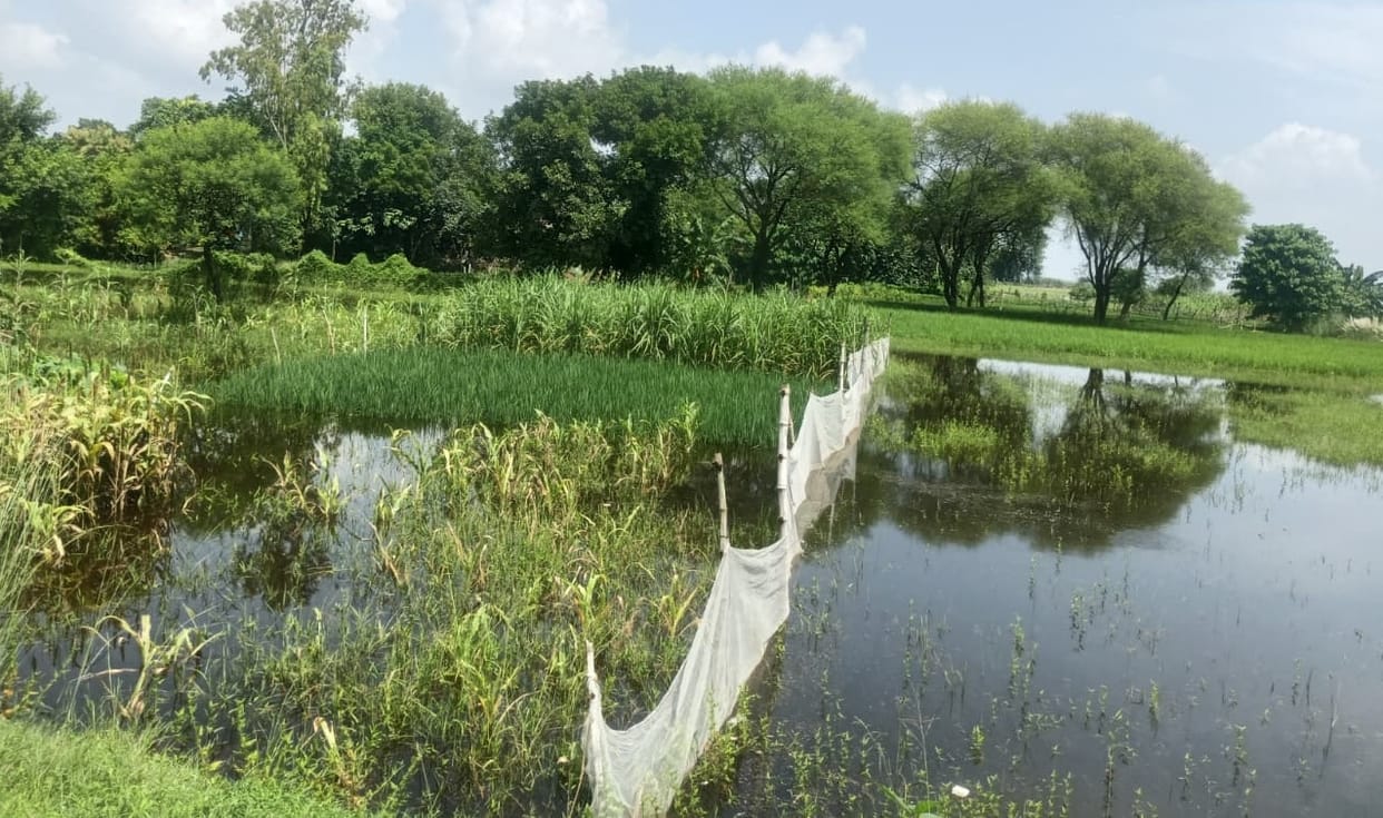 Rising water levels submerge connecting roads; population of over 30,000 affected.