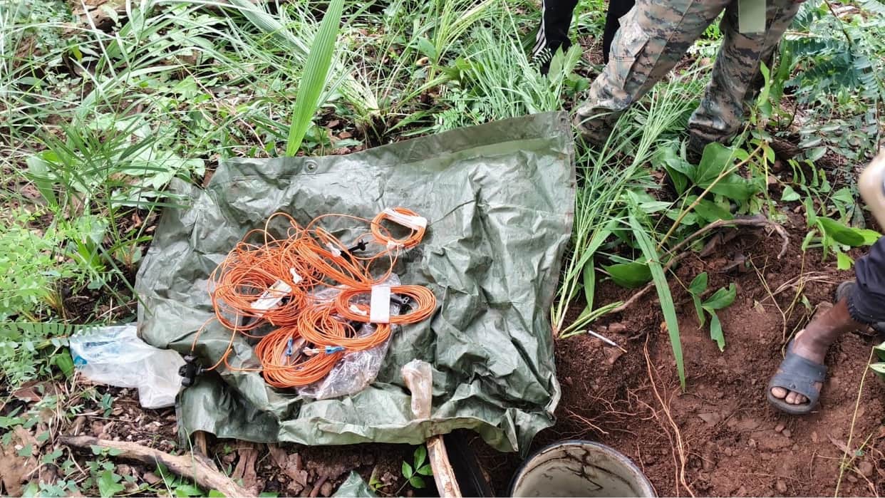 BGL components, grenades, and explosive materials recovered from a Maoist dump.