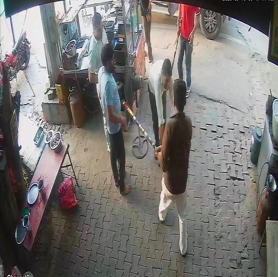 Brazen lawlessness in the city at 6 AM: Youths barged into shops and made off with cash and goods.