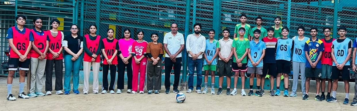 Selection of players for the district-level netball competition.