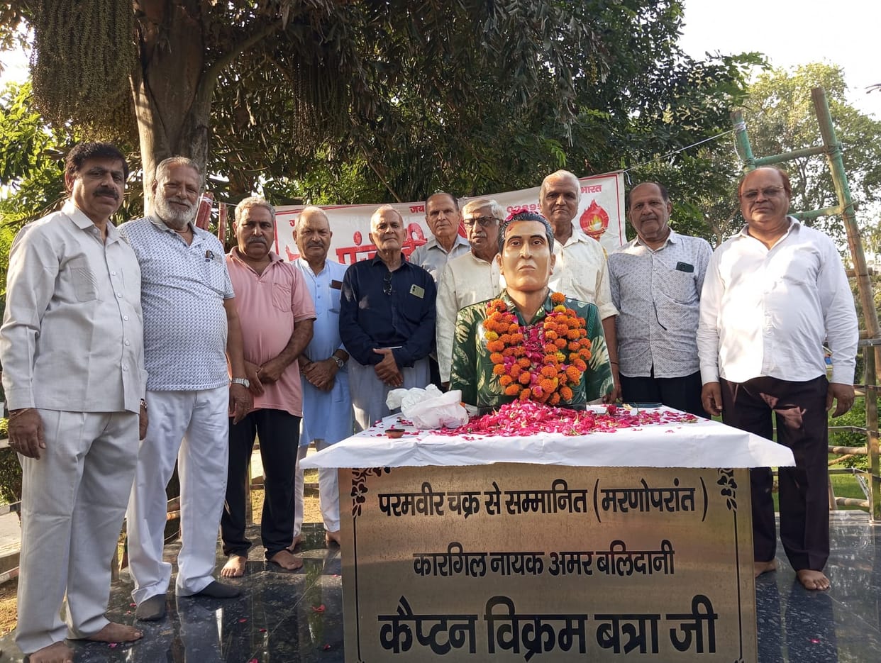 Milk *abhishek* performed on Captain Vikram Batra's statue on his birth anniversary.