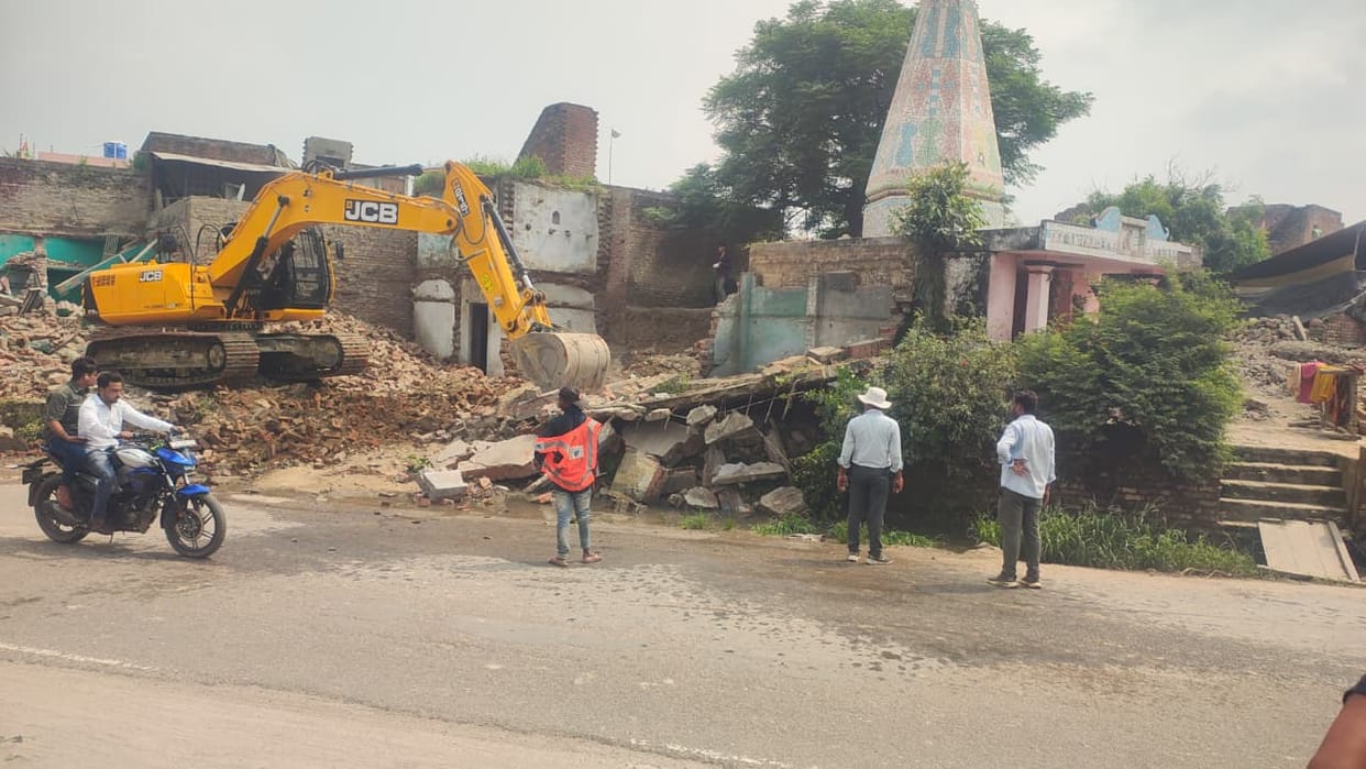 Land not vacated despite multiple notices; bulldozer deployed.