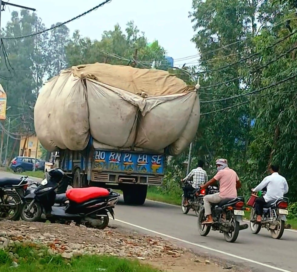 Risk of accidents due to overloaded vehicles on the road.