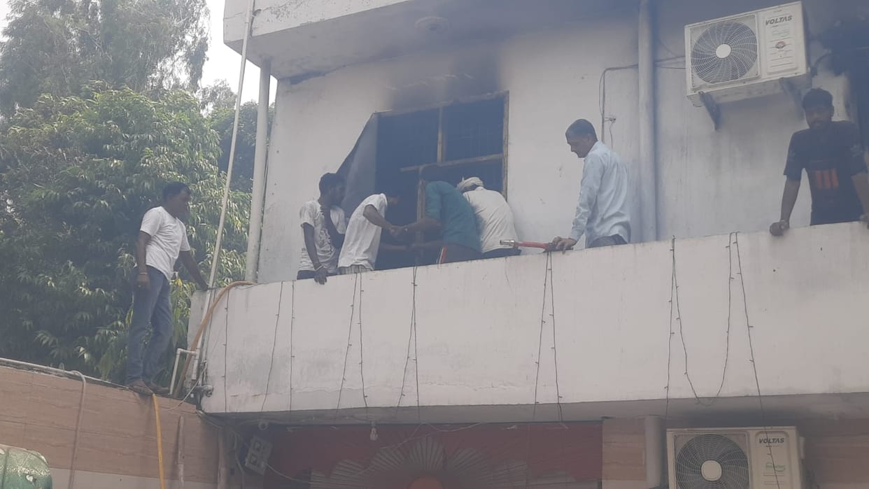 A *kirtan* was underway in the temple when a blast caused a fire in the shop located above it.