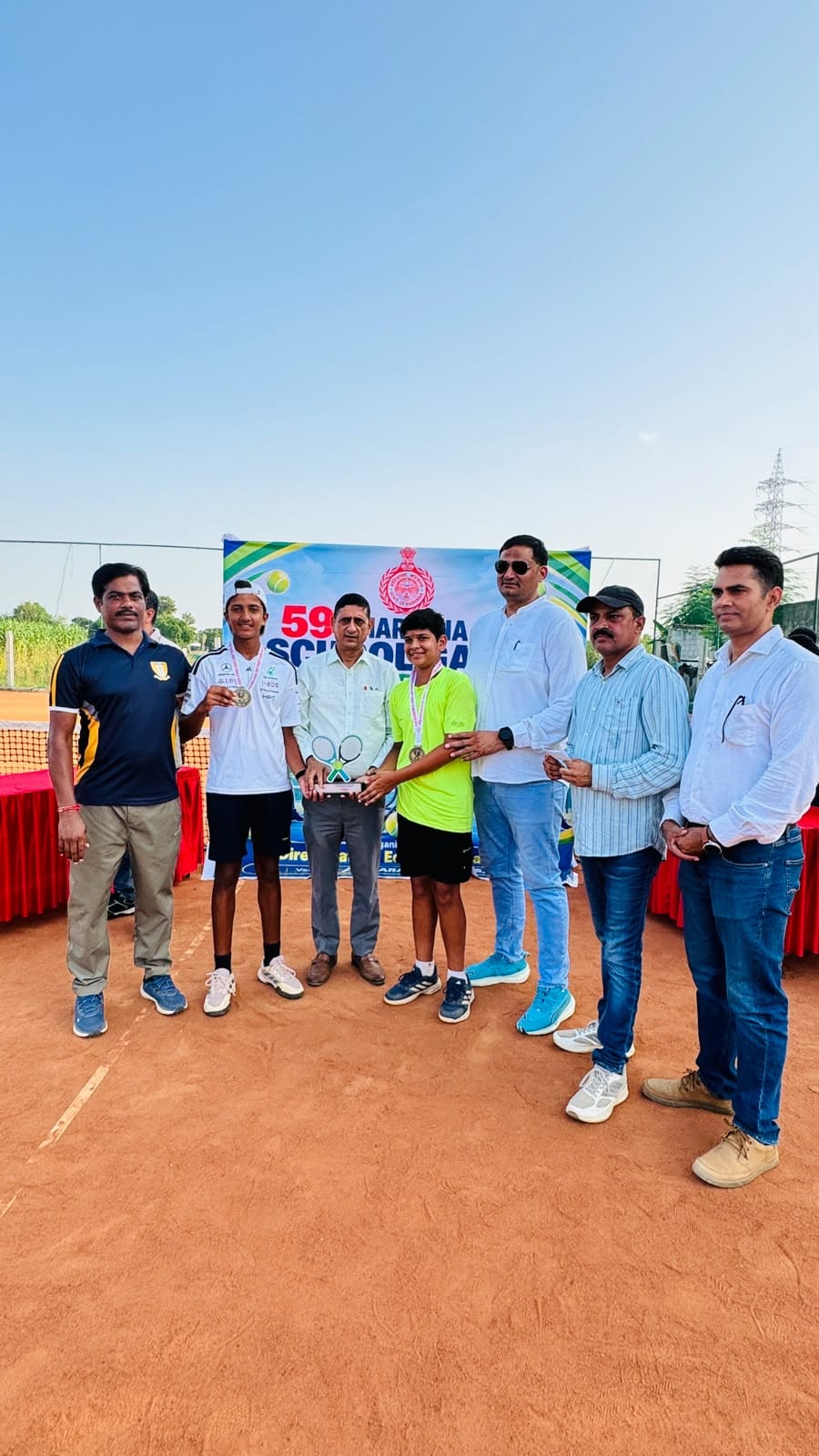 District team first in lawn tennis