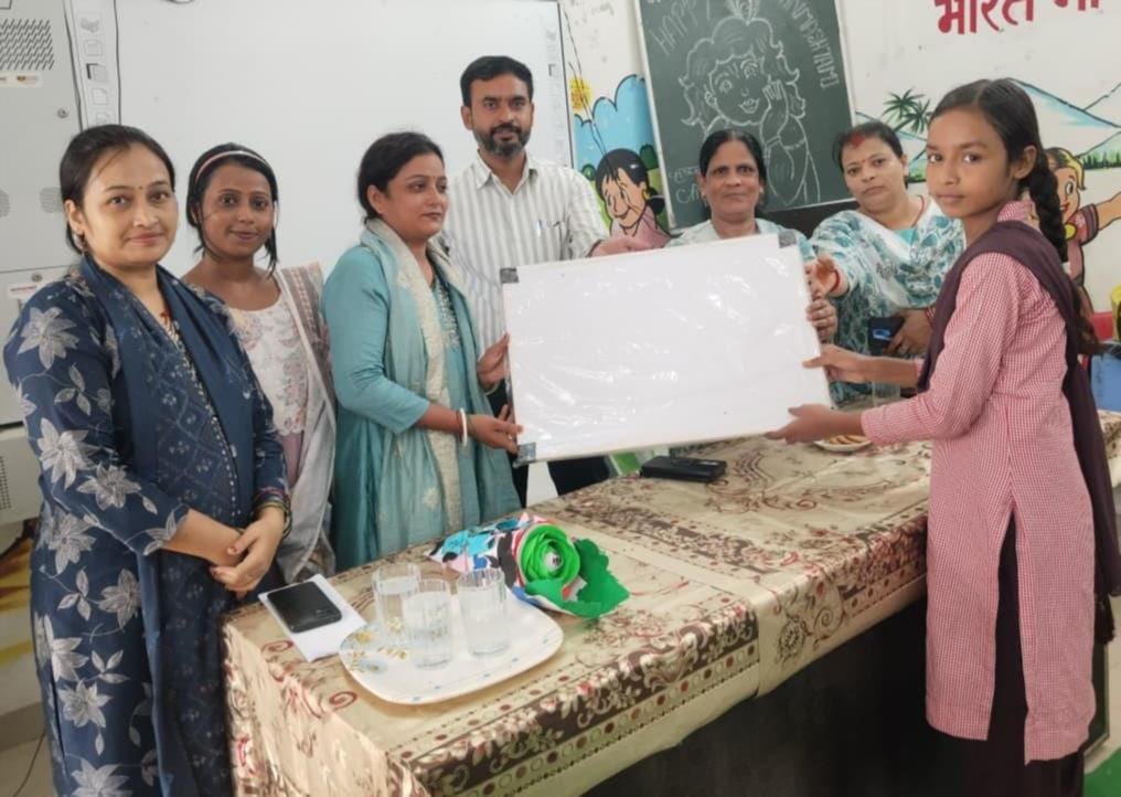 100 female students received study tables.