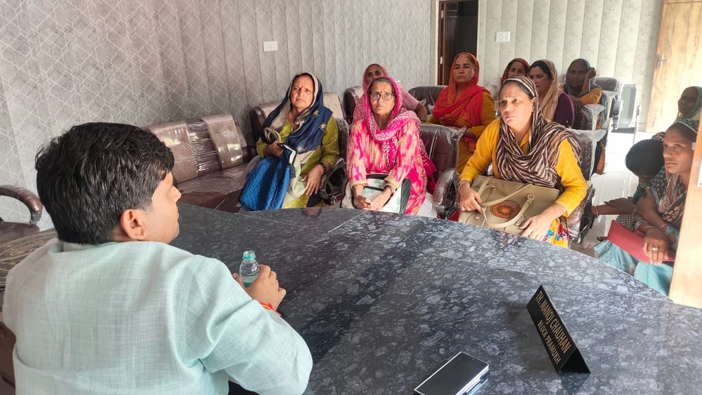 The ASHA worker was staging a sit-in due to a misunderstanding.