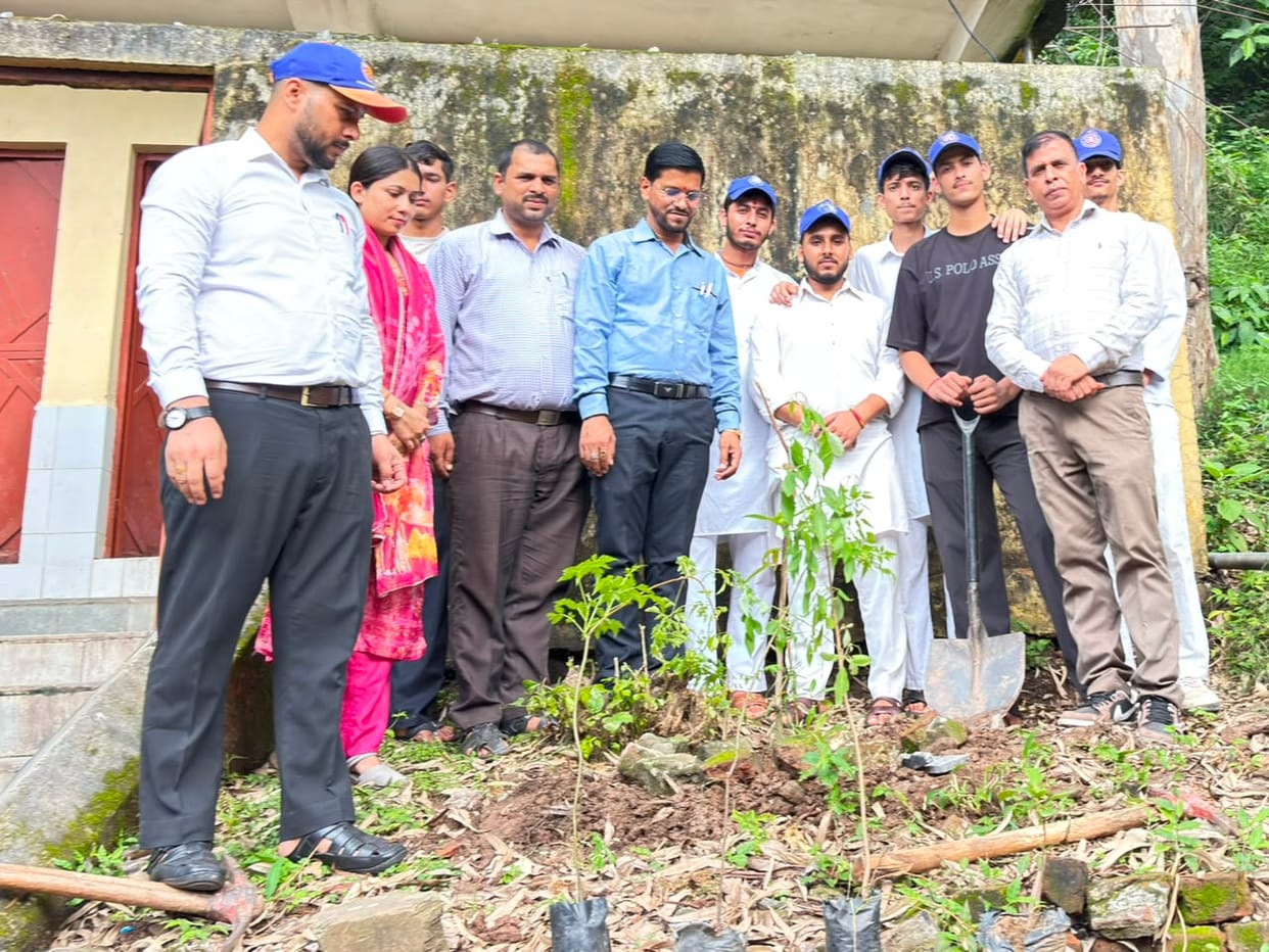 Volunteers conveyed a message of environmental conservation by planting saplings.