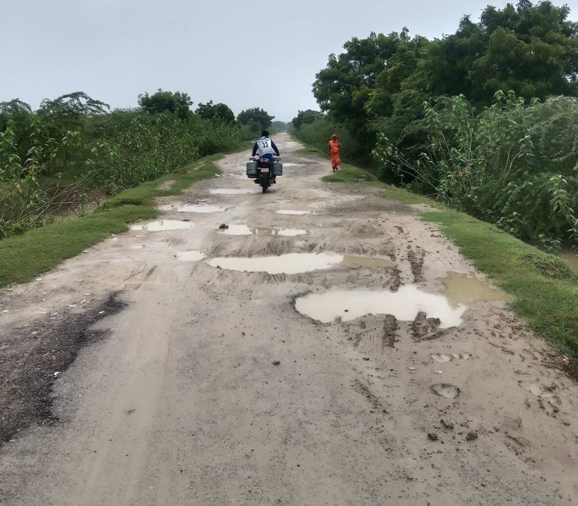 The promise to fill the potholes on the 700-meter unpaved road has also fallen into a pothole.