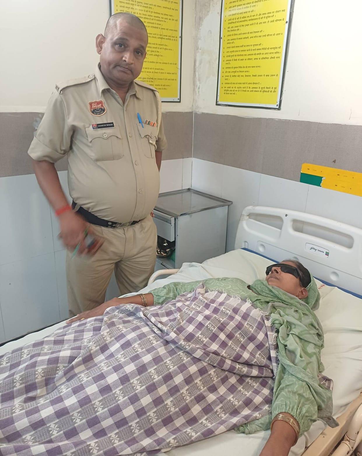 Son attacks mother with a knife; she is injured.