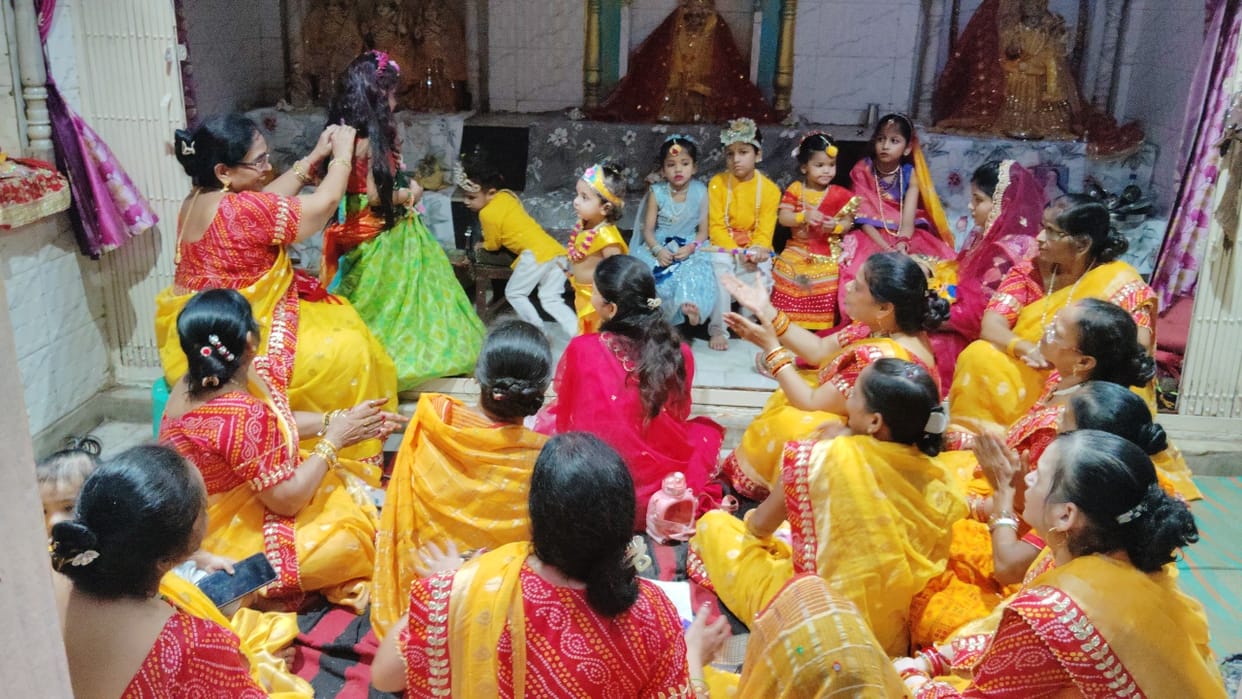 Women celebrated the Hariyali Teej festival by swinging on swings.