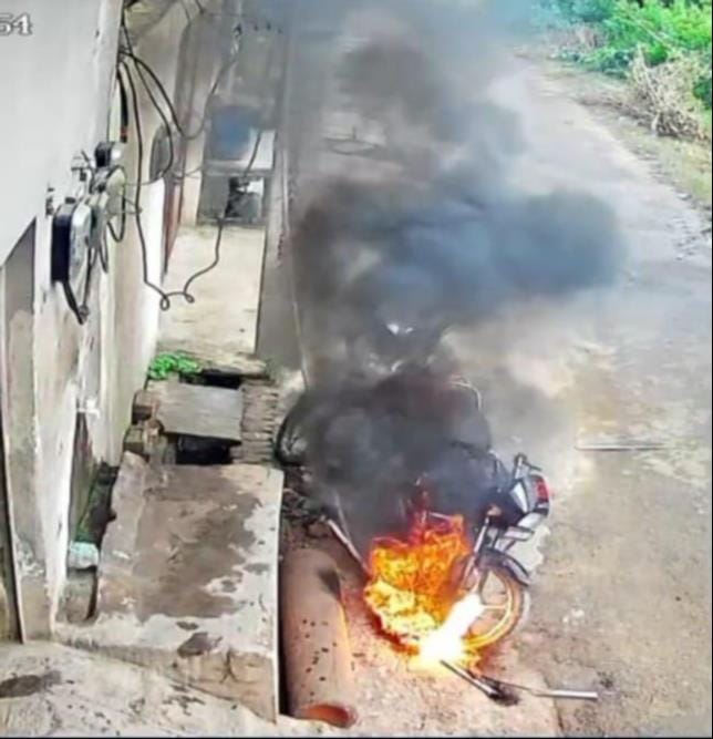 Electric wire falls on bike; it burns fiercely.