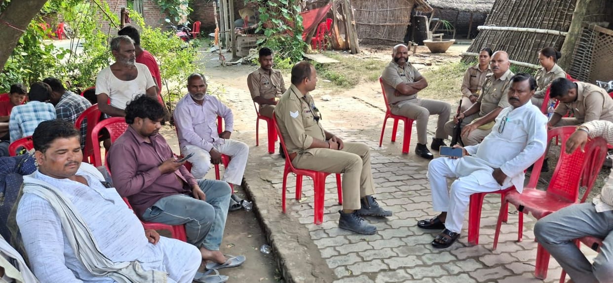 Police patrolling the village; barricades installed
