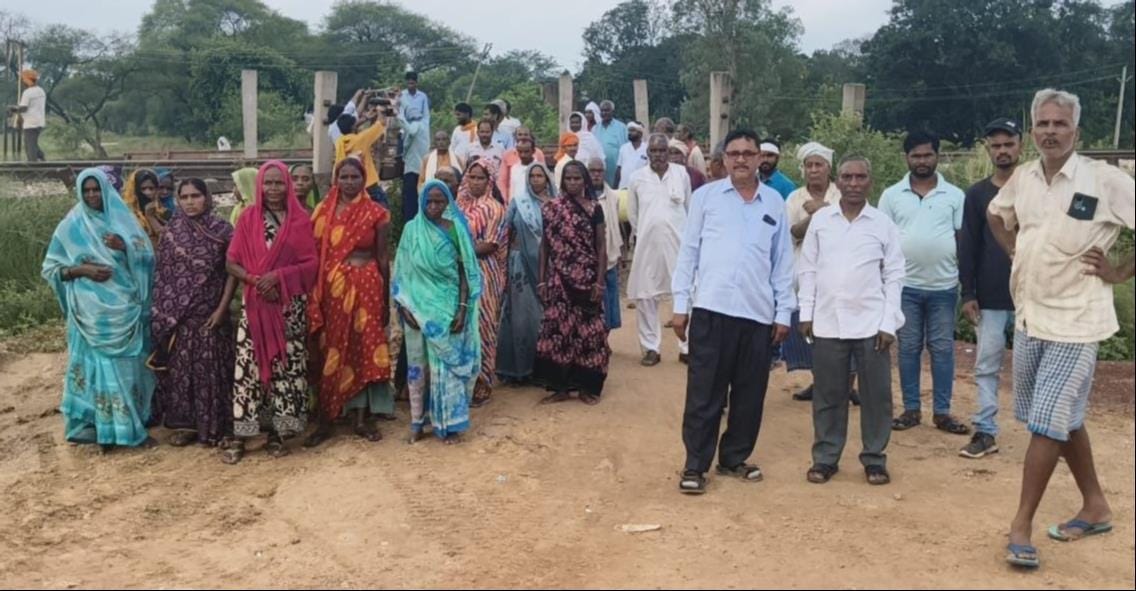 Protest on railway track; demand for underbridge.